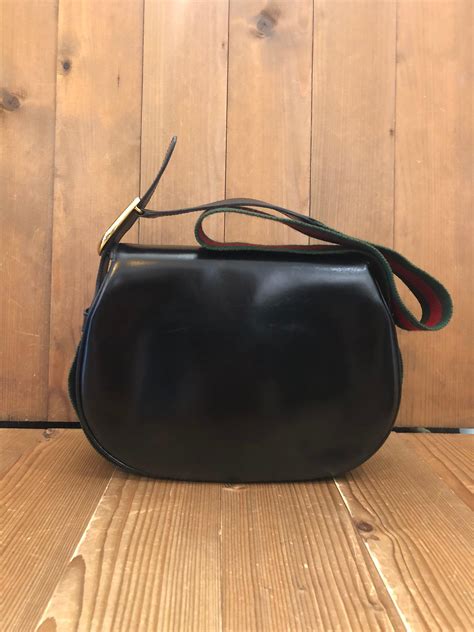 gucci zipper sleeve black leather|vintage black Gucci shoulder bag.